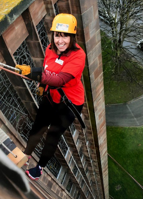 Sarah Perry, our managing partner abseiling in Coventry