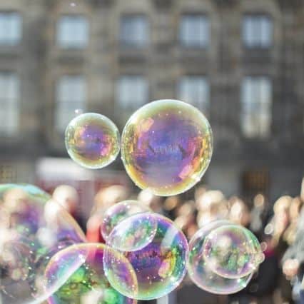 Bubbles with people blurred in background