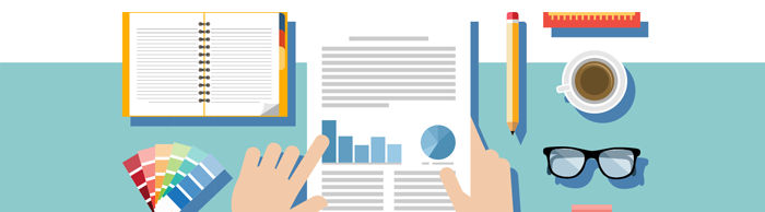 Hands pointing at a document showing graphs