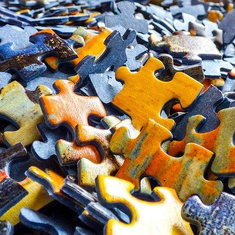 Jigsaw pieces in yellow and orange